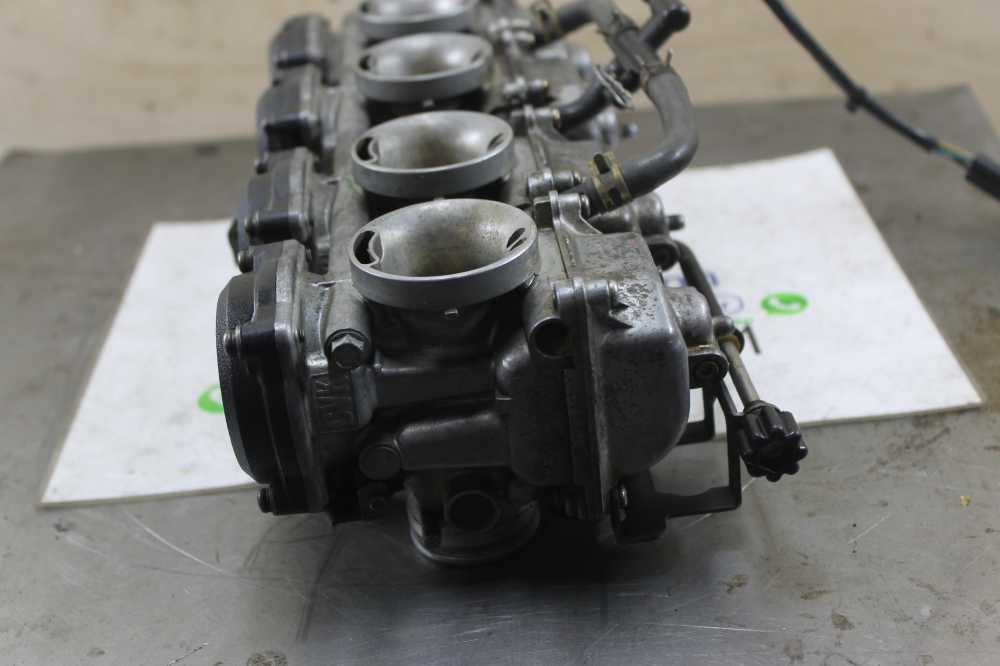 блок карбюраторов. карбюраторы honda cbr 1000f. блок карбюраторов. карбюратор хонда vt 650. карбюратор honda nv600.